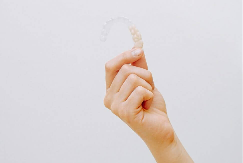 Clear aligner in hand